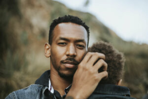 Serious dad with his son outdoors