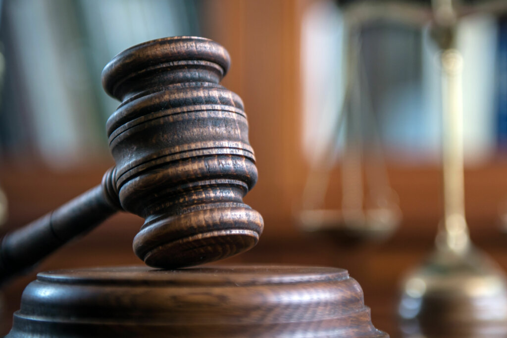 Law and Justice concept. Mallet of the judge, books, scales of justice.