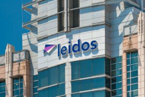 Logo installation on Freedom Square 1 (11951 Freedom Drive), part of the Leidos headquarters in Reston, VA.