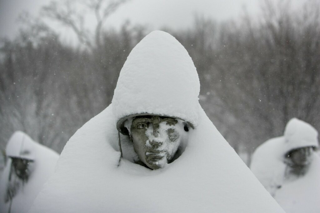 Statues at the Korean War Memorial in Washington, are covered in snow, Saturday, Feb. 6, 2010, as a massive snow storm hit the Washington area.