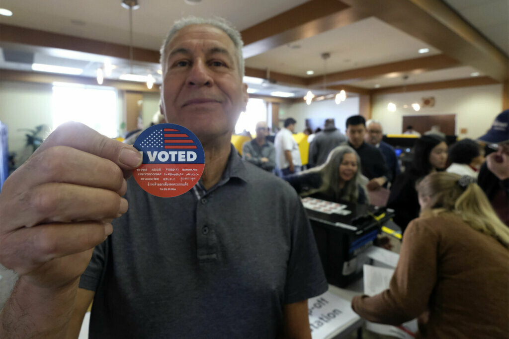 Frank Salazar, 70, shows an "I voted" sticker after casting his ballot on the Super Tuesday, at a voting center in Alhambra, Calif., Tuesday, March 3, 2020.