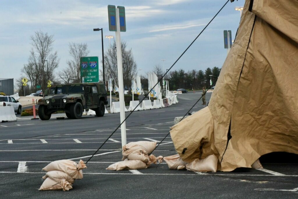 The Maryland National Guard is putting up tents at FedEx Field as part of a pilot program for screening on Friday, March 20, 2020. The goal for the site is to become a testing location in the future.