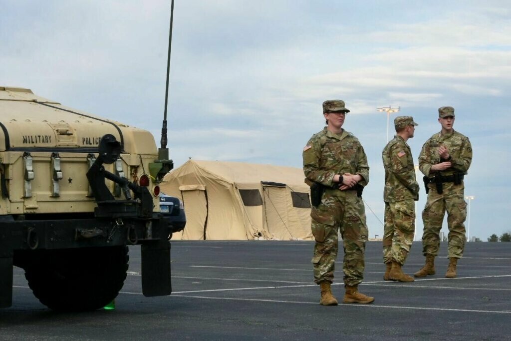 The Maryland National Guard is putting up tents at FedEx Field as part of a pilot program for screening on Friday, March 20, 2020. The goal for the site is to become a testing location in the future.