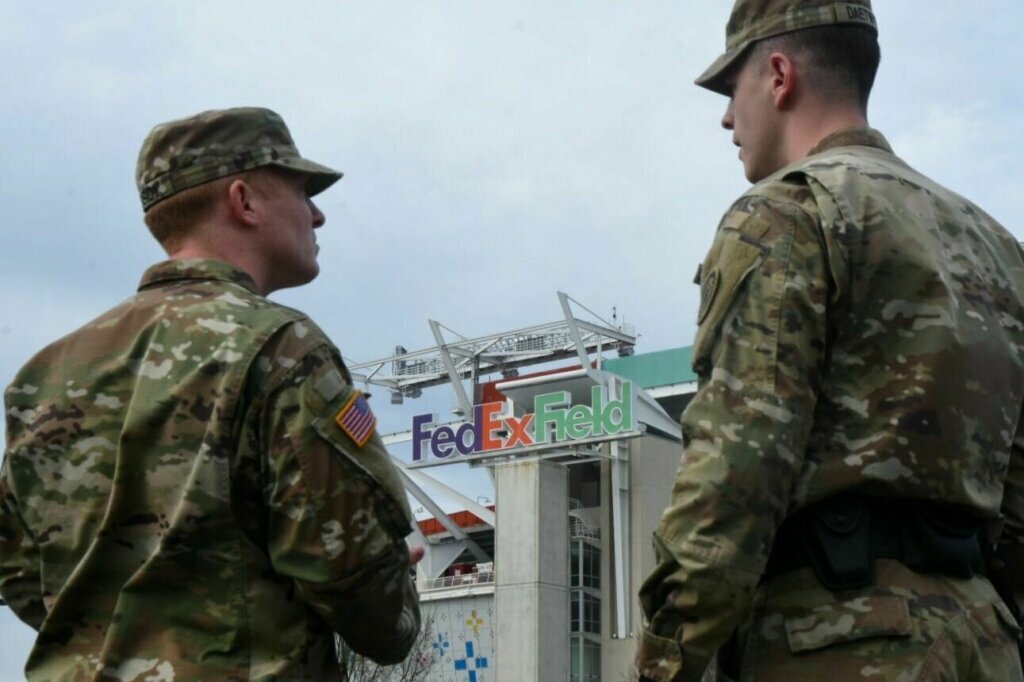 The Maryland National Guard is putting up tents at FedEx Field as part of a pilot program for screening on Friday, March 20, 2020. The goal for the site is to become a testing location in the future.