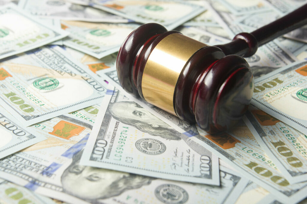 Judges Or Auctioneer Gavel On The Dollar Cash Background, Top View, Close Up. Concept For Corruption, Bankruptcy, Bail, Crime, Bribing, Fraud, Auction Bidding, Fines