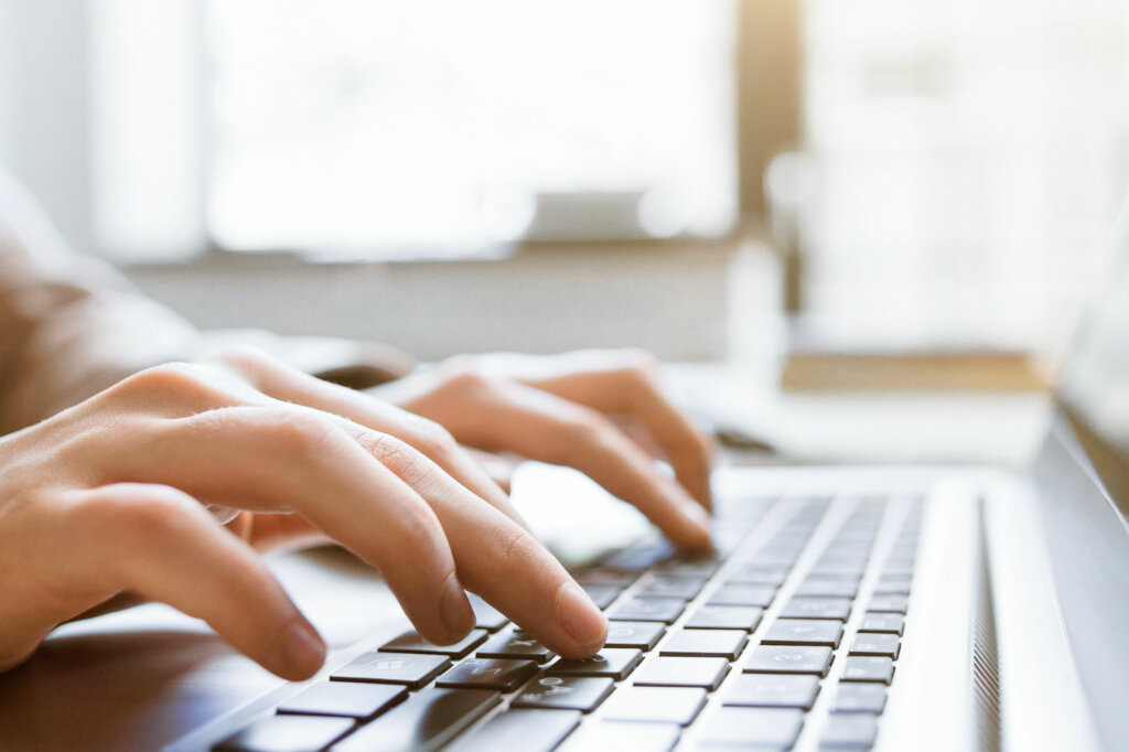 Laptop typing getty
