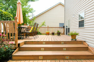 Modern wooden patio and garden area of a family house