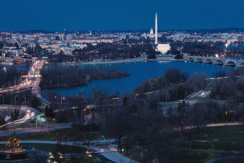 Aerial view of Washington D.C. shows Lincoln & Washington Memorial and U.S. Capitol