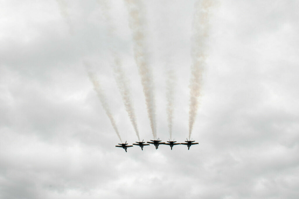 The U.S. Navy Flight Demonstration Squadron, the Blue Angels, fly over Bancroft Hall as midshipmen sing the Alma Mater, Navy Blue and Gold, during the fifth swearing-in event for the United States Naval Academy Class of 2020. (Courtesy U.S. Navy/Josiah Pearce)