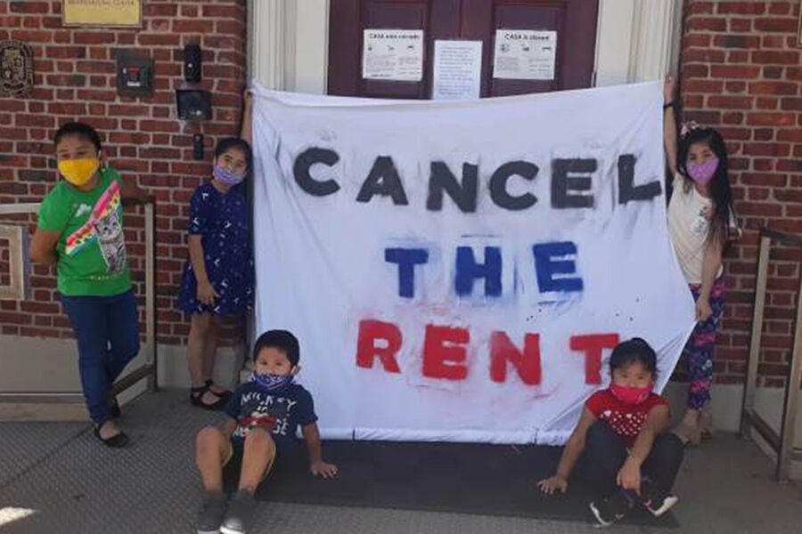 In front of CASA's Langley Park headquarters, children from the neighborhood express their views on housing issues. Photo courtesy of CASA