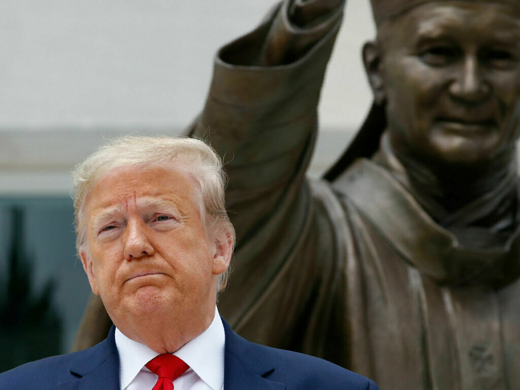President Donald Trump visits Saint John Paul II National Shrine with first lady Melania Trump, Tuesday, June 2, 2020, in Washington. (AP Photo/Patrick Semansky)