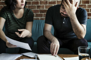 Couple managing the debt
