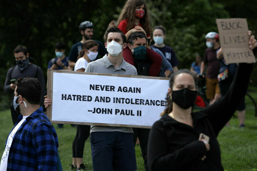 Demonstrators stage a protest near the Saint John Paul II National Shrine, where President Donald Trump planned a visit, in response to the death of George Floyd while under police custody June 2, 2020 in Washington, D.C.