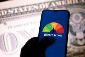 In this photo illustration a businessman holds his