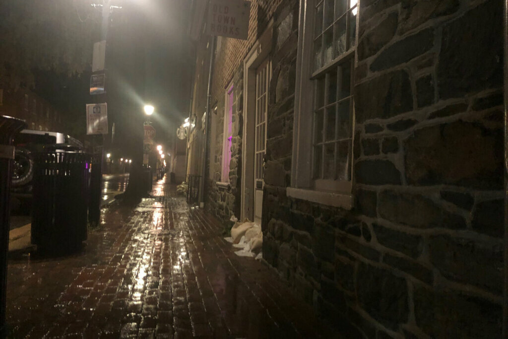 Old Town Alexandria is prone to flooding. The city ran out of sandbags when they were distributed on Aug. 3. (WTOP/Melissa Howell)