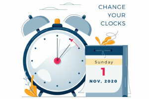 Daylight Saving Time ends concept. The hand of the clocks turning to winter time. Calendar with marked date, text Change your clocks. DST ends in usa, vector illustration in modern flat style design