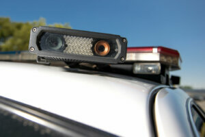 License plate reader on top of a police car.
