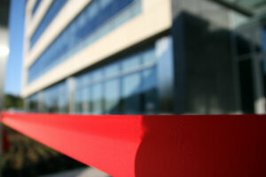 Red Ribbon in front of Building