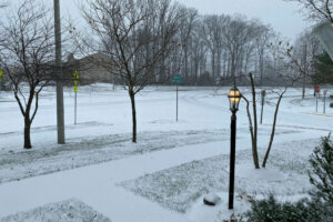 Snow covered roads and sidewalks in Haymarket, Virginia. (WTOP/Brian Oliger)