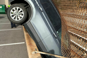 A car crashed through the fence between the Twinbrook and Rockville Metro stations at around 10:30 a.m. Thursday morning.
