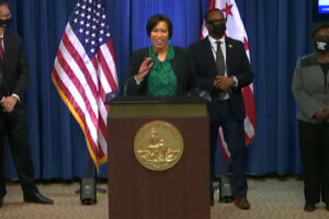 D.C. Mayor Muriel Bowser speaks at a news conference Monday while flanked by new appointees.