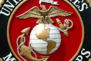 The US Marine Corps logo is seen March