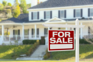 Home For Sale Sign in Front of New House