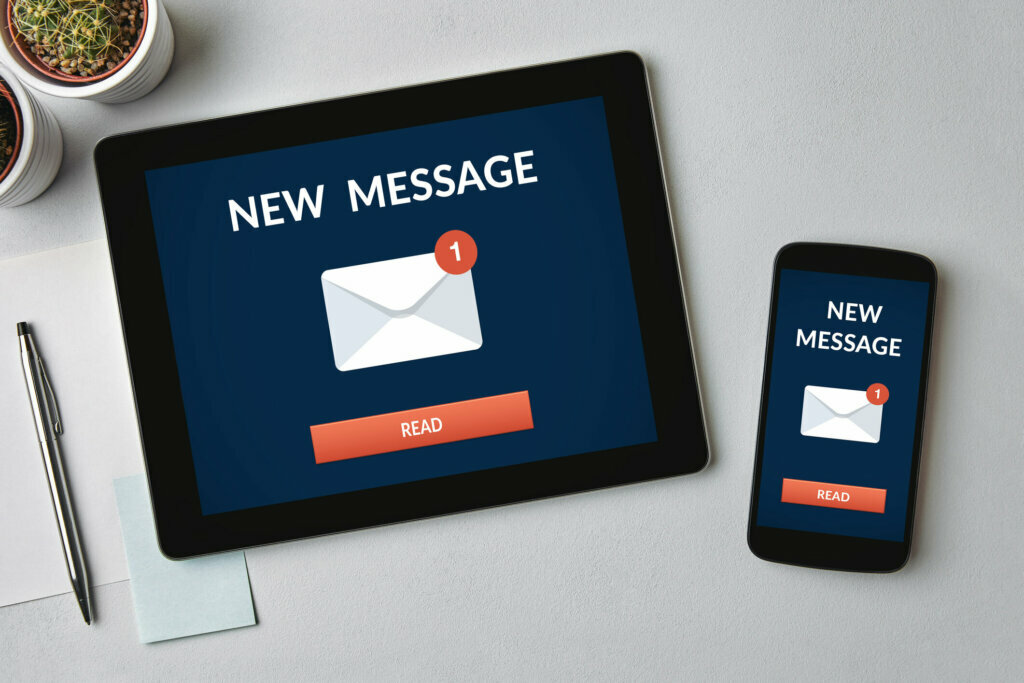 New message notification concept on tablet and smartphone screen