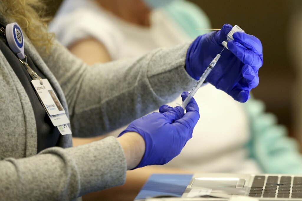 Virus Outbreak US Surge