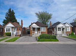 Street with old fashioned 1950s style working class bungalows