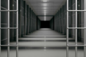 Prison interior. Jail cells and shadows, dark background. 3d illustration