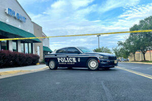 Fairfax County police on the scene where a man was found shot to death in Chantilly, Virginia.