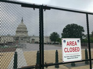 Thousands of National Guard troops are gone, but nearly five months after the attack on the U.S. Capitol, fencing still blocks the public from the grounds surrounding the iconic building.