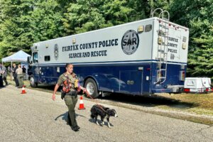 Fairfax County police searching woods in Lorton, Va, half mile from home of 72yr old Emily Lu, who was last seen at an Aldi, on June 3.