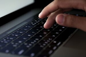 Close up,Finger,Typing,On,Keyboard,Computer,Working,At,Night