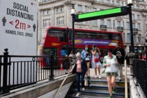 People enter the Oxford Circus tube station in central London on June 16.