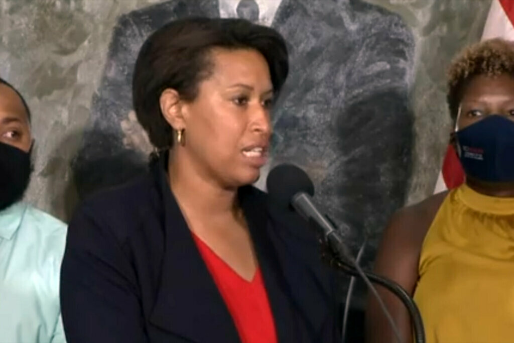 D.C. Mayor Muriel Bowser talks to the press at a Tuesday briefing.