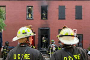 D.C. Fire and EMS fight a blaze at The Alibi pub just north of the National Mall on Tuesday morning.