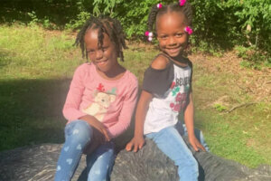 Tyrone Belton and his two daughters, Faith and Heavyn, were struck while walking in a crosswalk in Southeast last week. (Courtesy Tyrone Belton)
