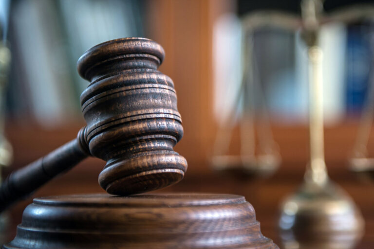Law and Justice concept. Mallet of the judge, books, scales of justice.