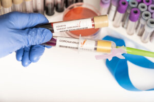 Coronavirus 2019 nCoV variant OMICRON Blood Sample. New Epidemic Corona Virus. South African variant.