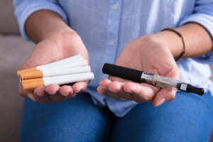 Woman Holding Electronic Cigarette