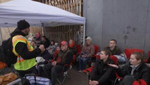 Ukrainians wait to cross U.S. Mexican border after U.S. promise to welcome 100,000 refugees