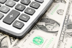 Calculator and money.