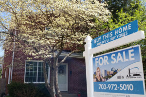 A house in Alexandria is seen for sale in April 2022. (WTOP/Colleen Kelleher)