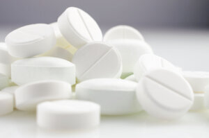 White medicine antibiotic pills