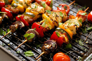 Vegetable and meat skewers in a herb marinade