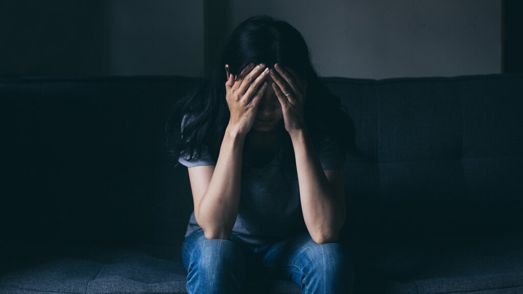 Sad serious woman.depressed emotion panic attacks alone young pe