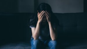 Sad serious woman.depressed emotion panic attacks alone young pe