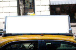 White blank billboard on the taxi.